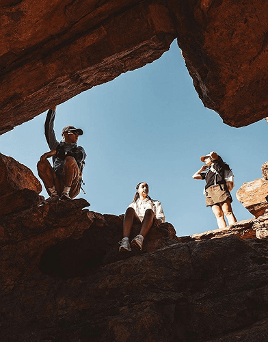 Group of travelers on rocky terrain